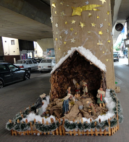 The nativity manger scene set up under the Bourj Hammoud bridge.